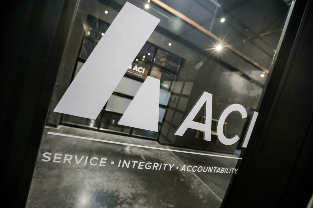 ACI logo on glass